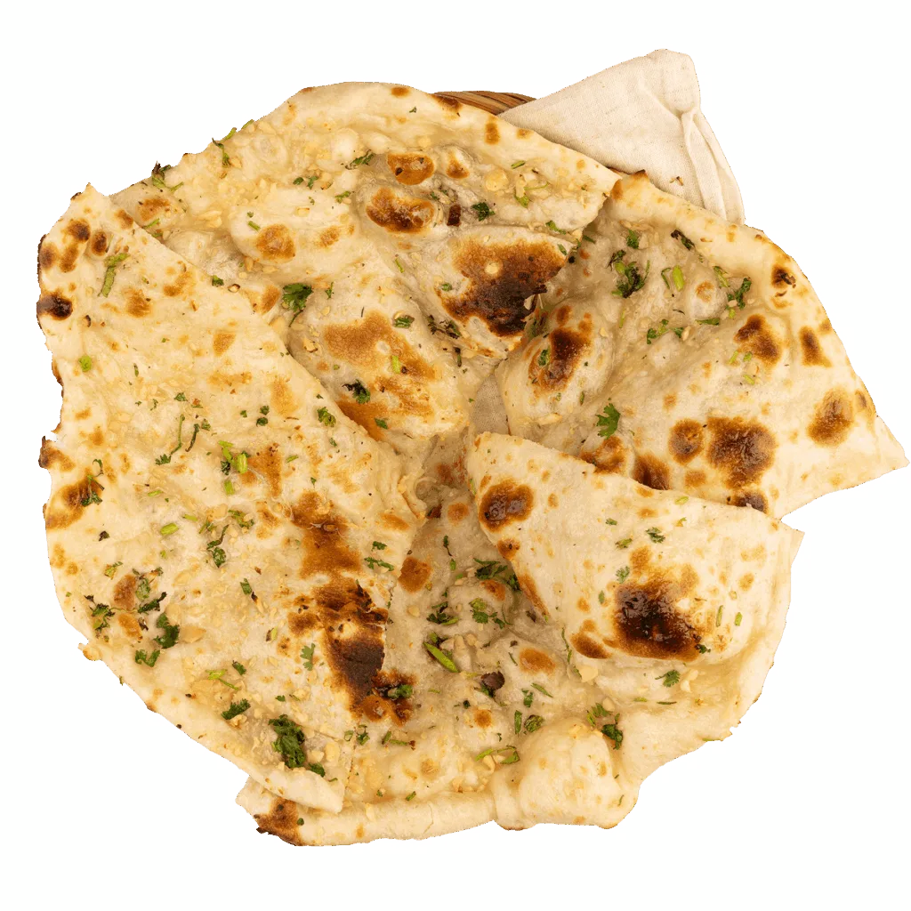 Garlic naan baked in a clay tandoor at Tikka Drive Chandler, AZ